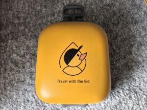 Ride-on suitcase for a toddler.