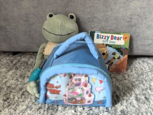 Toddler Essentials: toys, teddy bear and a book.